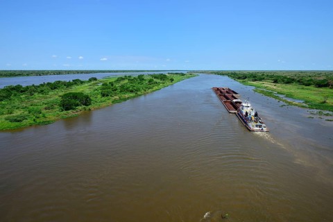 Pusher with iron ore cargo