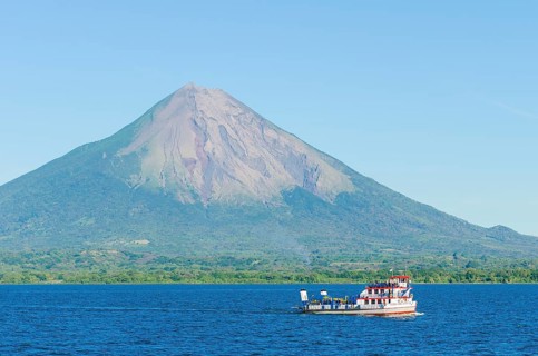Ferry in front of the island of Ometepe with the volcano Concepcion