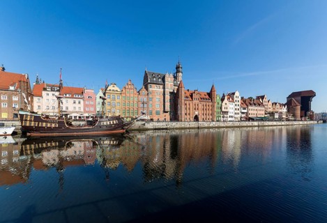 Row of houses in historic centre with ship