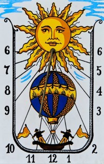 Sundial with sun and hot air balloon