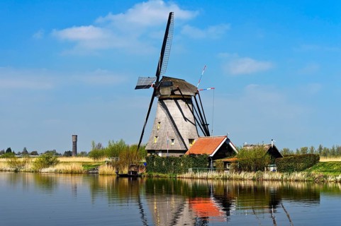 Dutch windmill over a canal
