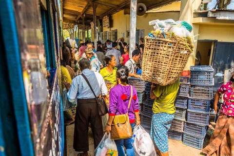 Locals boarding train on platform