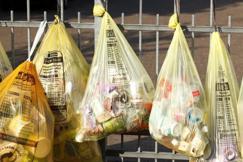 Yellow bags with plastic waste