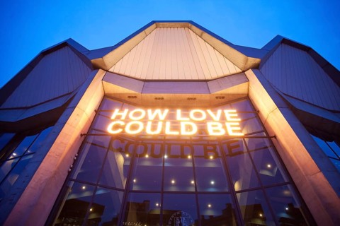 Audimax of the Ruhr University with the lettering How love could be
