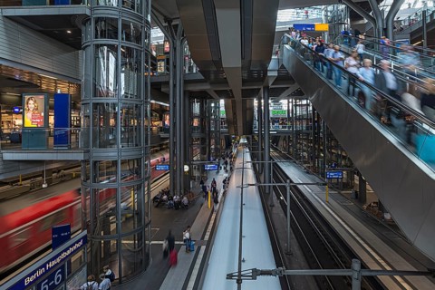 Basement escalator and glass elevator for long-distance and regional traffic