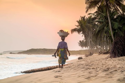 Local woman carrying goods on her head