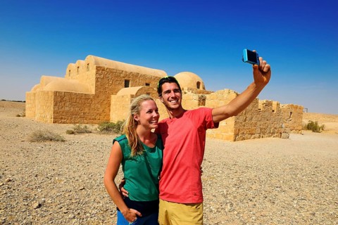 Tourists taking selfie