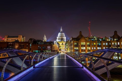 Illuminated Millennium Bridge and St. Paul's Cathedral