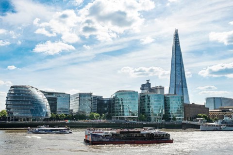 View over the Thames on More London Riverside with City Hall and skyscraper The Shard