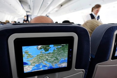 Screen with map on a seat in an airplane