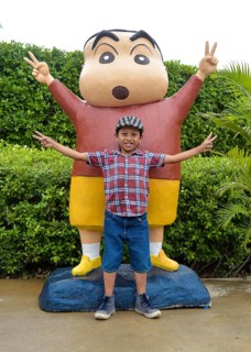 Young imitating with a cartoon figure