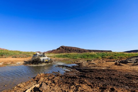 SUV crossing water