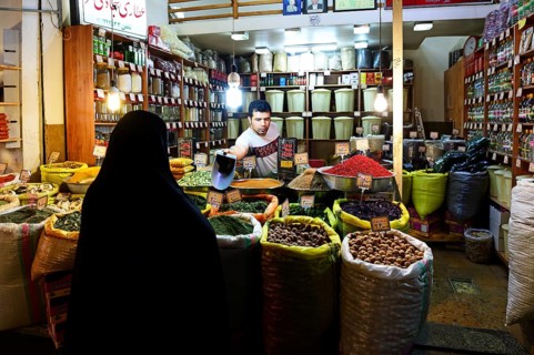 Spice dealer in the bazaar under the arcades of Imam Square