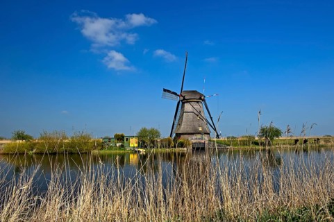 Dutch windmill over a canal
