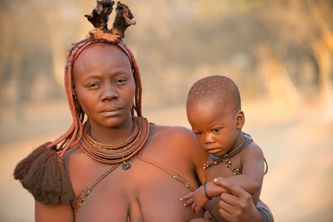 Portrait of a young woman with child