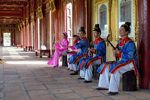 Vietnamese musicians in traditional robes of the court