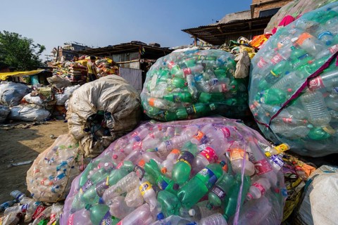 Big nets full of empty plastic bottles for recycling