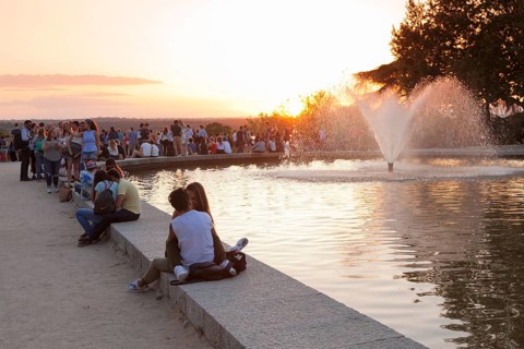 People enjoying the sunset at Debod Temple