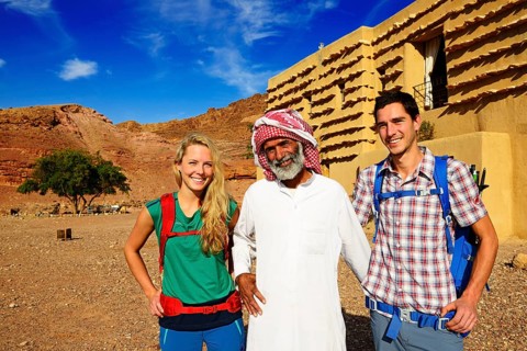 Bedouin with Tourists in front of Feynan Ecolodge
