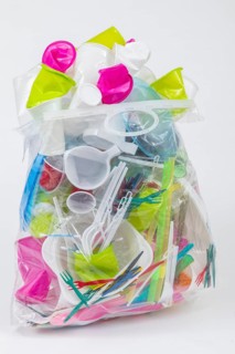Garbage bag filled with disposable crockery