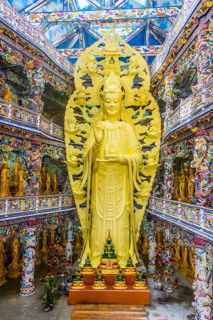 Giant golden standing Buddha