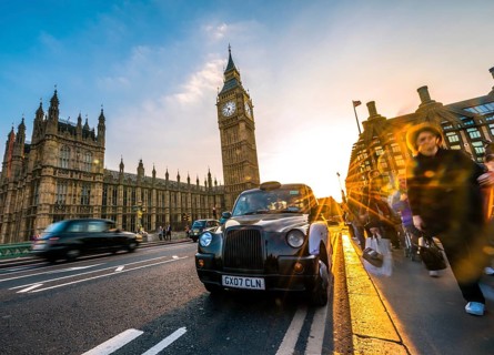 Black taxi in front of Big Ben