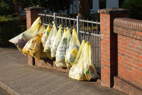 Yellow bags with plastic waste