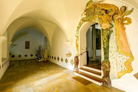 Cloister with stuccoed entrance to St. John Church