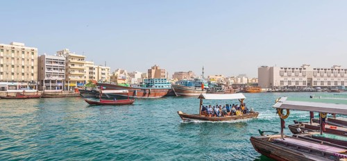 Small traditional ships and old dhow on the creek