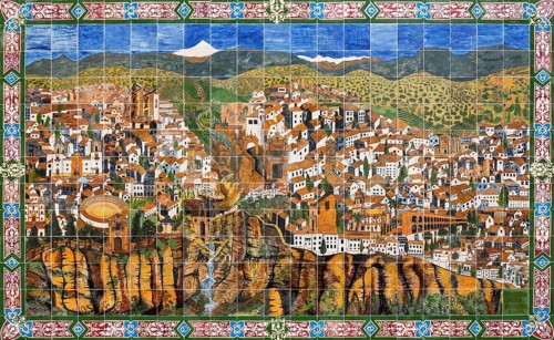 Ceramic board at a school displaying the White Townwith river gorge El Tajo and river Guadalevin
