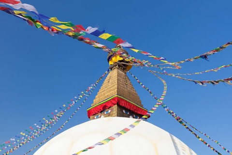 Buddhist stupa with prayer flags