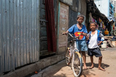 Two children with bicycle