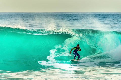 Surfer with large wave