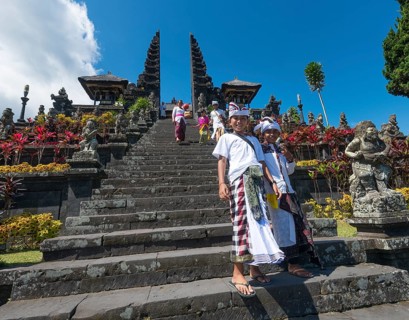 Devout Balinese descend stairs
