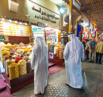 Two Arabs in white robes