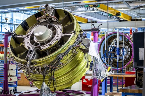 Airplane engine during maintenance in a warehouse