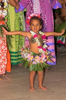 Little girl decorated with flowers