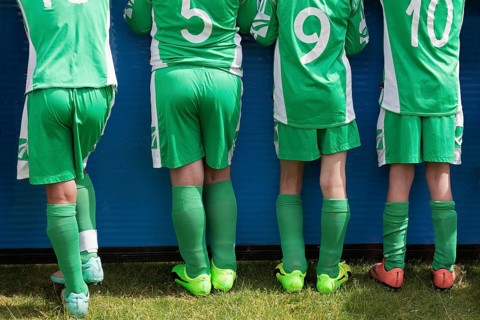 Four players of a youth football team