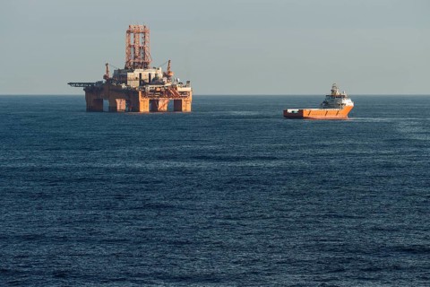 Supply vessel Normand Aurora next to West Phoenix oil rig