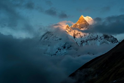View on the summit of the mountain Machapuchare at sunset
