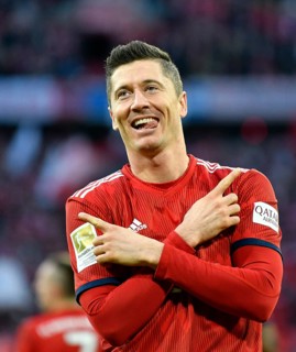 Typical goal celebration with crossed arms and outstretched tongue