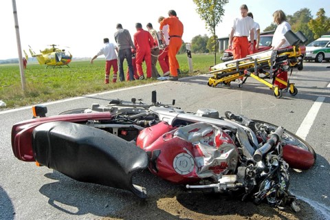 Wrecked motorcycle on road
