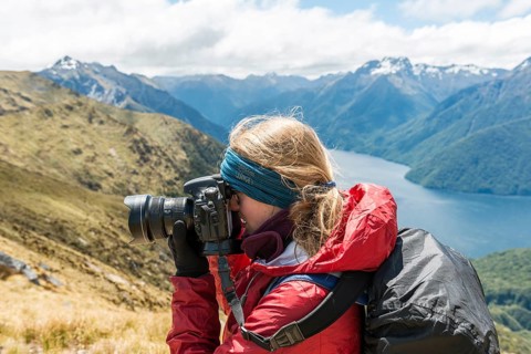 Young woman taking a picture