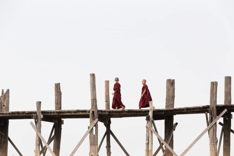 Monks crossing U Bein bridge
