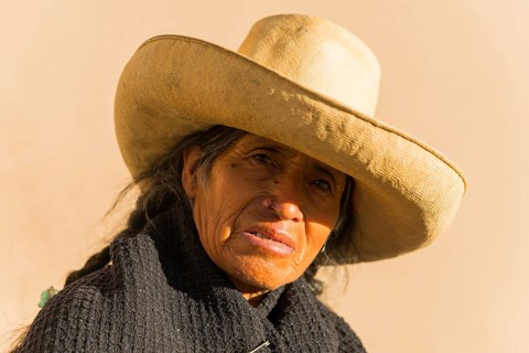 Old woman with straw hat