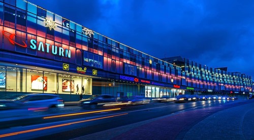 Evening lighting of a shopping centre at dusk