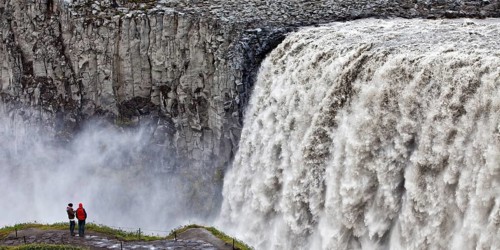 People at the waterfall Dettifoss