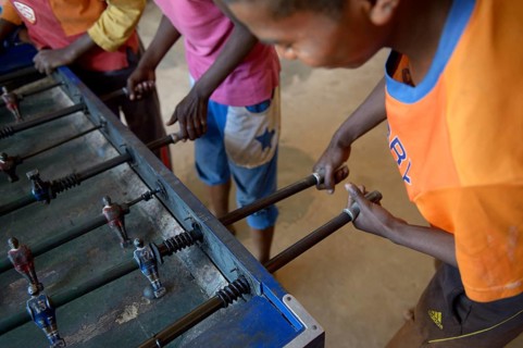 Boys play table football