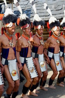 Naga tribal men in traditional clothing performing ritual dances