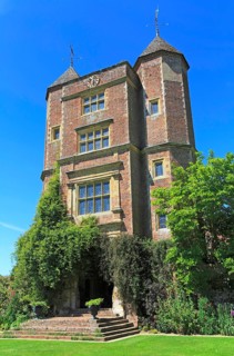 Red brick tower and blue sky